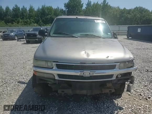 2001 Chevrolet Tahoe LS с VIN 1GNEC13TX1R162313, выставлен на аукционе Copart как лот 69262515 с пробегом 301 492 миль миль и Списание • Salvage title. История ставок и продаж доступна на DreamBid. Изображение 14.