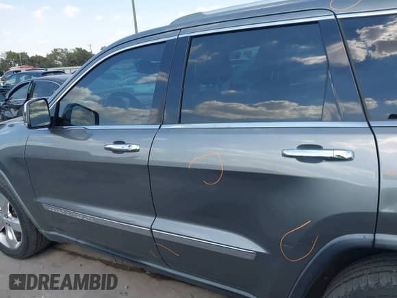 2012 Jeep Grand Cherokee Overland z VIN 1C4RJECT6CC311572, wystawiony jako IAAI lot #43343686 z przebiegiem 163 181 mil mil oraz . Historia ofert i sprzedaży dostępna na DreamBid. Obrazek 14.