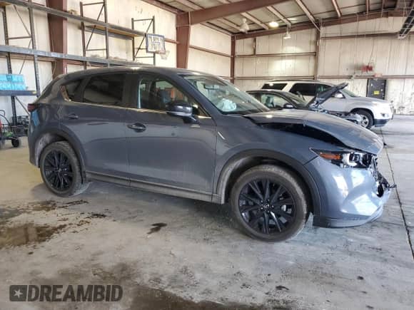 2024 Mazda CX-5 S Carbon Edition z VIN JM3KFBCL2R0408870, wystawiony jako Copart lot #64036385 z przebiegiem 19 874 mil mil oraz Szkoda całkowita • Salvage title. Historia ofert i sprzedaży dostępna na DreamBid. Obrazek 4.