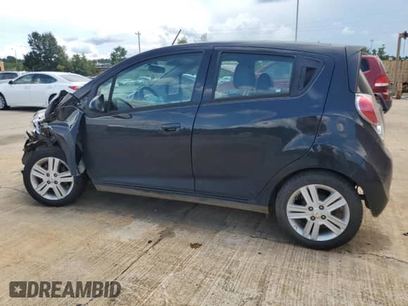 2015 Chevrolet Spark LS with VIN KL8CB6S90FC803204, listed as a Copart auction lot 69191245 with 126,559 mi miles and Salvage title. Bid and sale history available at DreamBid. Image 2.