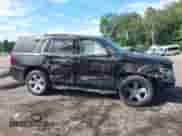 2018 Chevrolet Tahoe LT with VIN 1GNSKBKC4JR156035, listed as a IAAI auction lot 43009937 with 152,555 mi miles and . Bid and sale history available at DreamBid. Image 14.