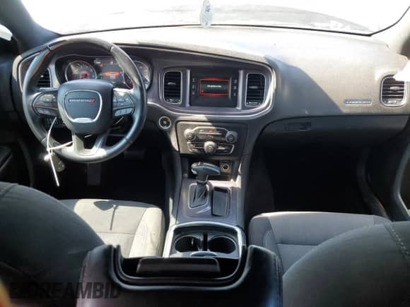 2015 Dodge Charger SE with VIN 2C3CDXFG5FH742319, listed as a Copart auction lot 71221175 with 106,487 mi miles and Salvage title. Bid and sale history available at DreamBid. Image 8.