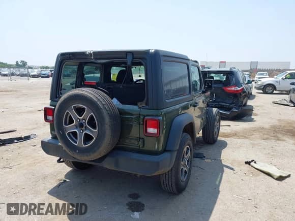 2023 Jeep Wrangler Sport with VIN 1C4HJXAG1PW650435, listed as a IAAI auction lot 42333006 with 16,980 mi miles and . Bid and sale history available at DreamBid. Image 4.