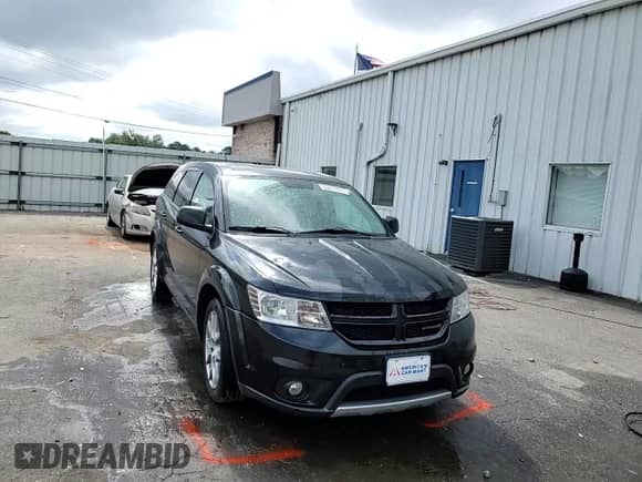 2013 Dodge Journey R/T Rallye z VIN 3C4PDDEG2DT591943, wystawiony jako Copart lot #65811805 z przebiegiem 132 731 mil mil oraz Szkoda całkowita • Salvage title. Historia ofert i sprzedaży dostępna na DreamBid. Obrazek 14.