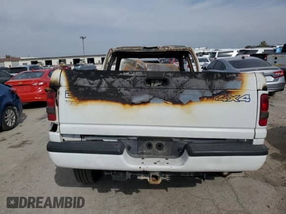 2000 Dodge 1500 с VIN 1B7HF13Z8YJ159968, выставлен на аукционе Copart как лот 77462274 с пробегом Не указан миль и На запчасти • Non repairable. История ставок и продаж доступна на DreamBid. Изображение 6.