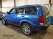 2009 Dodge Nitro SLT with VIN 1D8GU58K99W542909, listed as a Copart auction lot 79526084 with 172,511 mi miles and Salvage title. Bid and sale history available at DreamBid. Image 2.