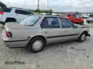 1991 Honda Accord with VIN 1HGCB7667MA143508, listed as a Copart auction lot 67898324 with 356,797 mi miles and Salvage title. Bid and sale history available at DreamBid. Image 3.