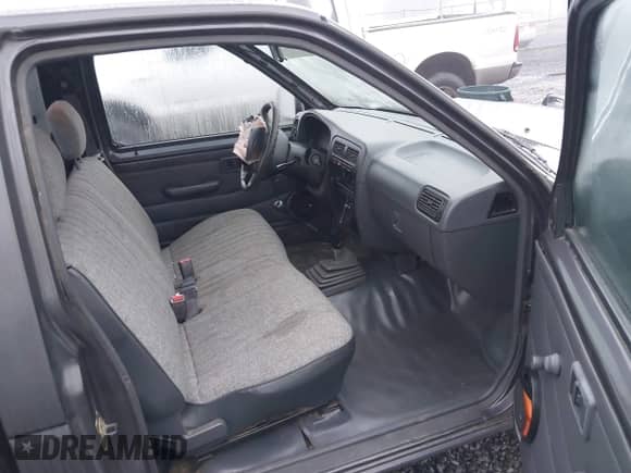 1997 Nissan Frontier XE with VIN 1N6SD11S7VC319806, listed as a IAAI auction lot 41349741 with 215,812 mi miles and . Bid and sale history available at DreamBid. Image 5.