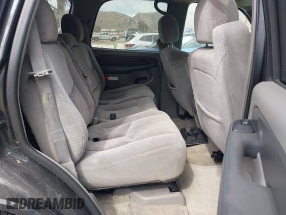 2003 Chevrolet Tahoe LS z VIN 1GNEC13T73R166712, wystawiony jako IAAI lot #43251150 z przebiegiem 243 592 mil mil oraz . Historia ofert i sprzedaży dostępna na DreamBid. Obrazek 8.