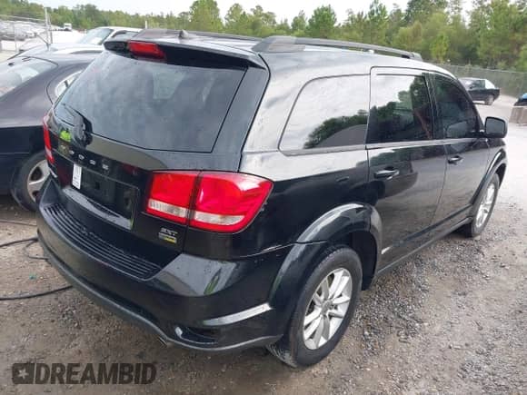 2015 Dodge Journey SXT with VIN 3C4PDCBG5FT743439, listed as a IAAI auction lot 43285964 with 185,420 mi miles and . Bid and sale history available at DreamBid. Image 4.