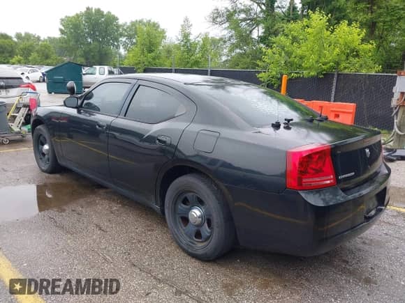 2007 Dodge Charger Police z VIN 2B3KA43H27H774305, wystawiony jako IAAI lot #42332163 z przebiegiem 154 918 mil mil oraz . Historia ofert i sprzedaży dostępna na DreamBid. Obrazek 3.