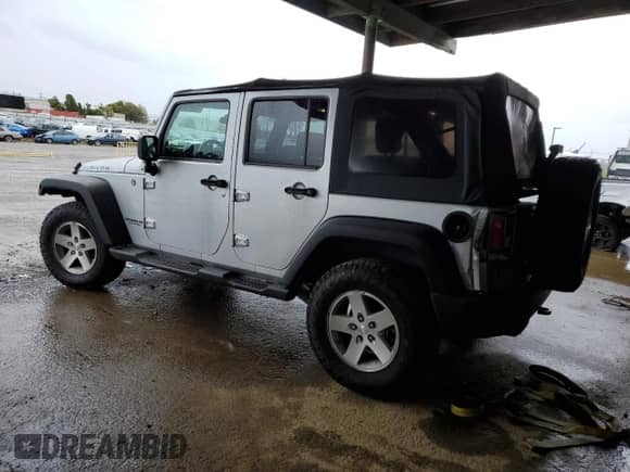 2007 Jeep Wrangler Unlimited Rubicon with VIN 1J4GA69187L127012, listed as a Copart auction lot 48818965 with 61,737 mi miles and Salvage title. Bid and sale history available at DreamBid. Image 2.