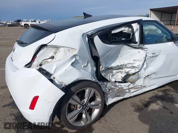 2017 Hyundai Veloster with VIN KMHTC6ADXHU318331, listed as a IAAI auction lot 41588356 with 48,282 mi miles and . Bid and sale history available at DreamBid. Image 6.