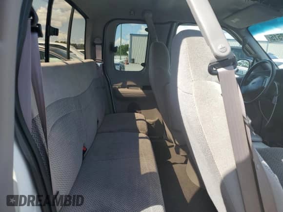 2000 Ford F-150 XL z VIN 1FTRX07LXYKA38662, wystawiony jako Copart lot #68012515 z przebiegiem 96 880 mil mil oraz Nie do naprawy • Non repairable. Historia ofert i sprzedaży dostępna na DreamBid. Obrazek 10.