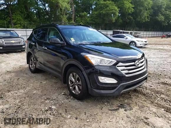 2016 Hyundai Santa Fe with VIN 5XYZU3LBXGG345566, listed as a Copart auction lot 55915735 with 142,742 mi miles and Salvage title. Bid and sale history available at DreamBid. Image 14.