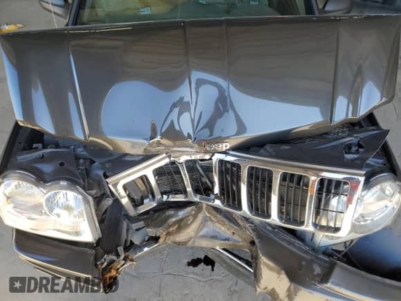 2006 Jeep Grand Cherokee Limited с VIN 1J4HR58266C115649, выставлен на аукционе Copart как лот 69500844 с пробегом Не указан миль и Списание • Salvage title. История ставок и продаж доступна на DreamBid. Изображение 12.