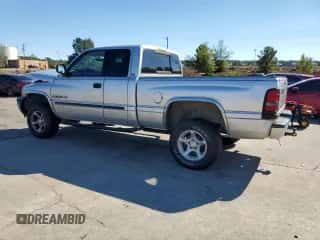 2001 Dodge 1500 z VIN 3B7HF13ZX1G728018, wystawiony jako Copart lot #86523065 z przebiegiem 159 194 mil mil oraz Szkoda całkowita • Salvage title. Historia ofert i sprzedaży dostępna na DreamBid. Obrazek 2.