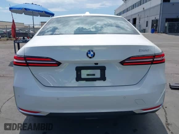 2024 BMW 5 Series 530i with VIN WBA43FJ06RCS61104, listed as a IAAI auction lot 43056084 with Not provided miles and . Bid and sale history available at DreamBid. Image 17.