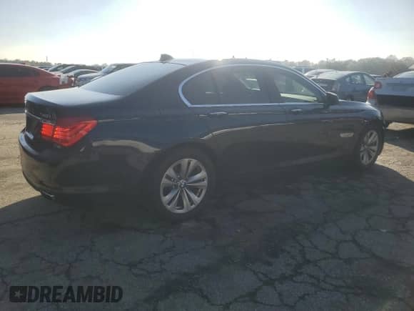 2011 BMW 7 Series 740i с VIN WBAKA4C51BC613053, выставлен на аукционе Copart как лот 81778304 с пробегом 92 634 миль миль и Списание • Salvage title. История ставок и продаж доступна на DreamBid. Изображение 3.