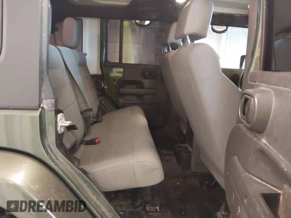 2008 Jeep Wrangler Unlimited Sahara with VIN 1J4GA59158L504309, listed as a IAAI auction lot 43292936 with 147,545 mi miles and . Bid and sale history available at DreamBid. Image 8.