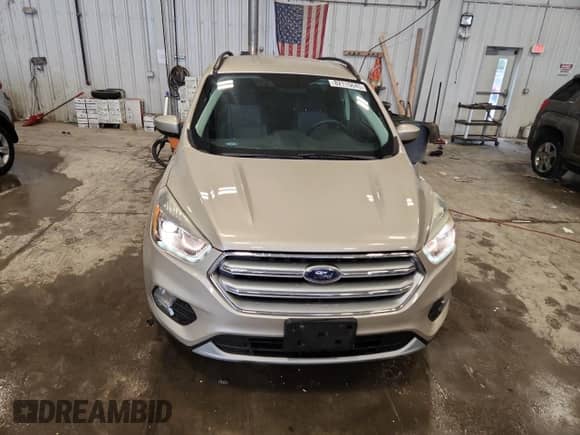 2017 Ford Escape SE с VIN 1FMCU9GD7HUC21075, выставлен на аукционе Copart как лот 82115645 с пробегом 91 949 миль миль и На запчасти • Non repairable. История ставок и продаж доступна на DreamBid. Изображение 5.