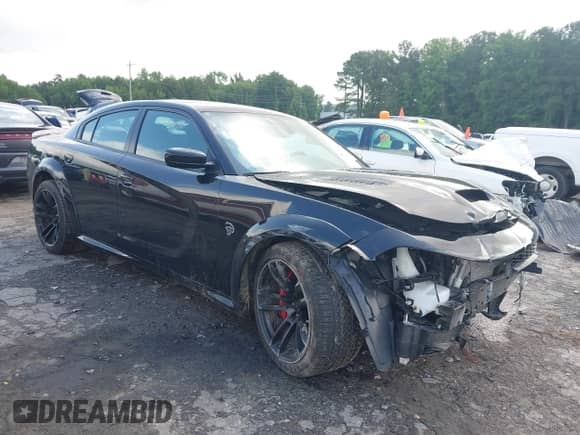 2021 Dodge Charger SRT Hellcat Redeye Widebody with VIN 2C3CDXL98MH620606, listed as a IAAI auction lot 42435270 with 30,819 mi miles and . Bid and sale history available at DreamBid. Image 1.