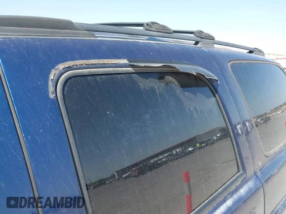 2001 Chevrolet Tahoe LT z VIN 1GNEC13T71J184865, wystawiony jako IAAI lot #41799799 z przebiegiem 290 196 mil mil oraz . Historia ofert i sprzedaży dostępna na DreamBid. Obrazek 13.