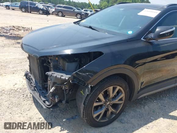 2017 Hyundai Santa Fe Ultimate z VIN 5XYZWDLAXHG468308, wystawiony jako IAAI lot #42660810 z przebiegiem 137 165 mil mil oraz . Historia ofert i sprzedaży dostępna na DreamBid. Obrazek 6.