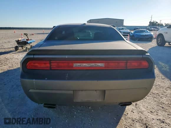 2012 Dodge Challenger SXT with VIN 2C3CDYAG4CH101526, listed as a Copart auction lot 90643015 with 130,011 mi miles and Clean title. Bid and sale history available at DreamBid. Image 6.