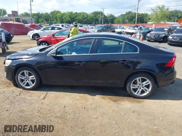 2015 Volvo S60 T5 Drive-E Premier with VIN YV126MFK1F1357935, listed as a IAAI auction lot 42812237 with 105,669 mi miles and . Bid and sale history available at DreamBid. Image 14.