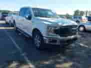 2018 Ford F-150 XL z VIN 1FTEW1EG7JFC51158, wystawiony jako IAAI lot #43347828 z przebiegiem 65 574 mil mil oraz . Historia ofert i sprzedaży dostępna na DreamBid. Obrazek 1.