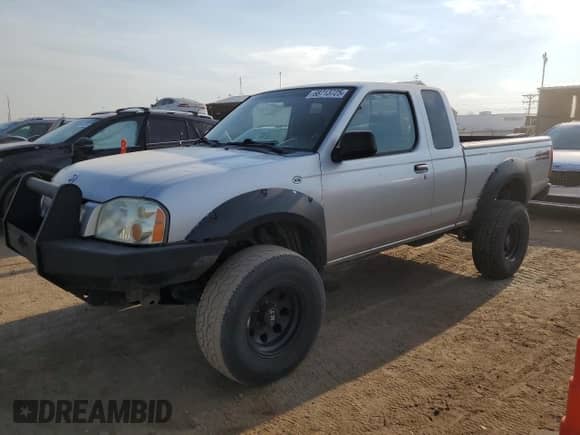 2004 Nissan Frontier XE Desert Runner z VIN 1N6ED26Y54C481898, wystawiony jako Copart lot #68713725 z przebiegiem 126 682 mil mil oraz Czysty tytuł • Clean title. Historia ofert i sprzedaży dostępna na DreamBid. Obrazek 1.