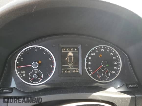 2013 Volkswagen Tiguan SE z VIN WVGAV3AX2DW611603, wystawiony jako Copart lot #53968245 z przebiegiem 117 785 mil mil oraz Szkoda całkowita • Salvage title. Historia ofert i sprzedaży dostępna na DreamBid. Obrazek 9.