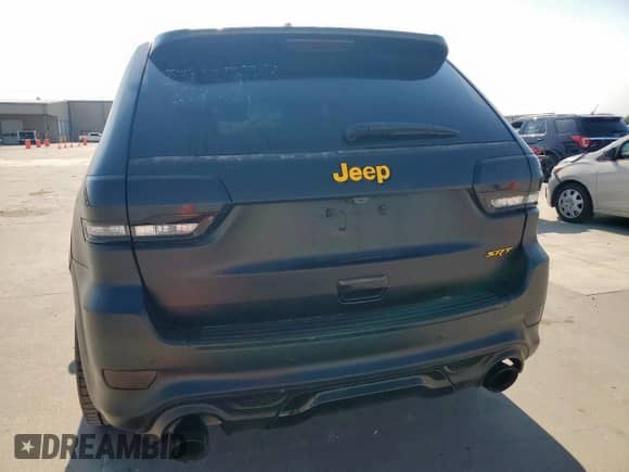 2014 Jeep Grand Cherokee SRT-8 с VIN 1C4RJFDJ8EC325415, выставлен на аукционе Copart как лот 80197385 с пробегом 103 604 миль миль и Списание • Salvage title. История ставок и продаж доступна на DreamBid. Изображение 6.