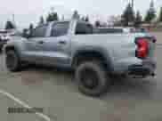 2023 Chevrolet Colorado 4WD Trail Boss z VIN 1GCPTEEK3P1197621, wystawiony jako Copart lot #65346155 z przebiegiem 41 432 mil mil oraz Szkoda całkowita • Salvage title. Historia ofert i sprzedaży dostępna na DreamBid. Obrazek 2.