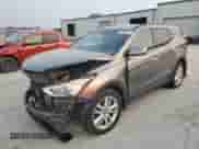 2014 Hyundai Santa Fe с VIN 5XYZUDLA8EG202755, выставлен на аукционе Copart как лот 67065515 с пробегом 125 235 миль миль и Списание • Salvage title. История ставок и продаж доступна на DreamBid. Изображение 1.