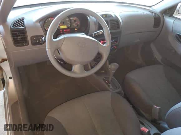 2004 Hyundai Accent GL с VIN KMHCG35CX4U283952, выставлен на аукционе Copart как лот 73587124 с пробегом 41 742 миль миль и Списание • Salvage title. История ставок и продаж доступна на DreamBid. Изображение 8.