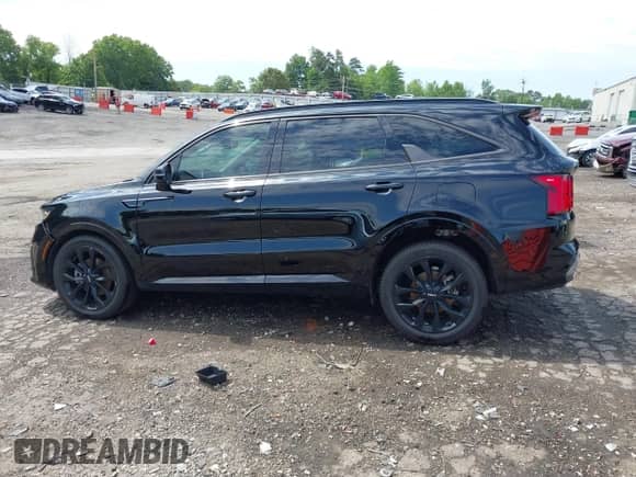 2023 Kia Sorento SX with VIN 5XYRK4LF4PG174554, listed as a IAAI auction lot 42319577 with 72,113 mi miles and . Bid and sale history available at DreamBid. Image 14.