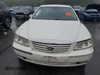 2007 Hyundai Azera SE z VIN KMHFC46F57A239919, wystawiony jako Copart lot #58903275 z przebiegiem 158 033 mil mil oraz Szkoda całkowita • Salvage title. Historia ofert i sprzedaży dostępna na DreamBid. Obrazek 5.