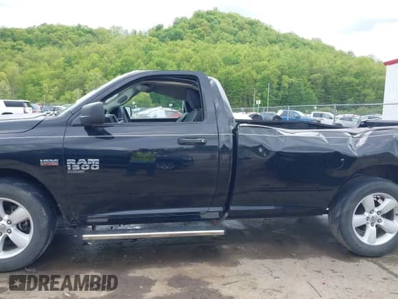 2021 Ram 1500 Tradesman with VIN 3C6JR7DT4MG704279, listed as a IAAI auction lot 42212201 with 21,528 mi miles and . Bid and sale history available at DreamBid. Image 14.