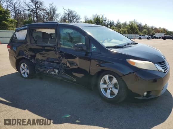2012 Toyota Sienna LE AAS with VIN 5TDKK3DCXCS230395, listed as a Copart auction lot 80191145 with 169,378 mi miles and Salvage title. Bid and sale history available at DreamBid. Image 4.