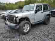 2012 Jeep Wrangler Sport z VIN 1C4AJWAG6CL228765, wystawiony jako Copart lot #80979855 z przebiegiem 216 434 mil mil oraz Szkoda całkowita • Salvage title. Historia ofert i sprzedaży dostępna na DreamBid. Obrazek 1.