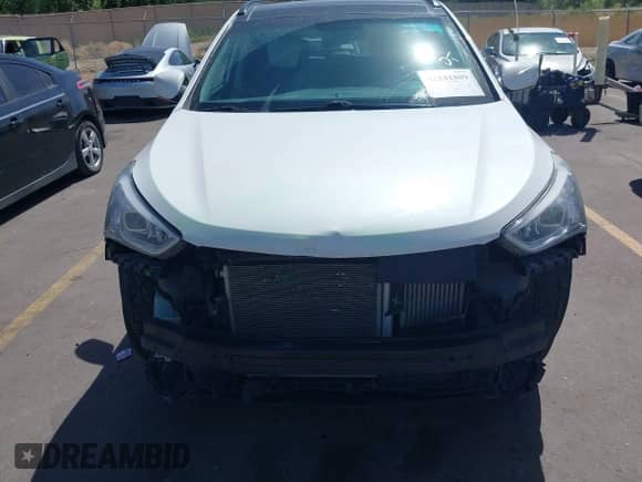 2014 Hyundai Santa Fe z VIN 5XYZWDLA8EG140946, wystawiony jako IAAI lot #42241809 z przebiegiem 137 584 mil mil oraz . Historia ofert i sprzedaży dostępna na DreamBid. Obrazek 13.