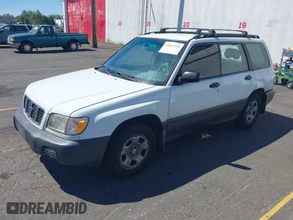 2002 Subaru Forester L with VIN JF1SF63502H750381, listed as a IAAI auction lot 42865556 with 202,452 mi miles and . Bid and sale history available at DreamBid. Image 2.