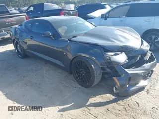 2017 Chevrolet Camaro 1LT z VIN 1G1FB1RS4H0203279, wystawiony jako IAAI lot #43307990 z przebiegiem 68 922 mil mil oraz . Historia ofert i sprzedaży dostępna na DreamBid. Obrazek 1.