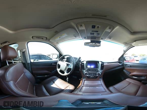 2015 Chevrolet Tahoe LTZ with VIN 1GNSCCKC1FR599320, listed as a IAAI auction lot 43093837 with 124,751 mi miles and . Bid and sale history available at DreamBid. Image 18.