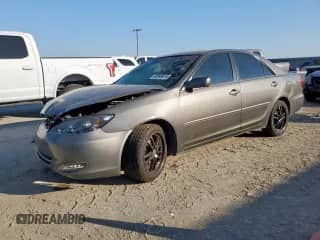 2004 Toyota Camry LE с VIN 4T1BE32K74U923371, выставлен на аукционе Copart как лот 82349615 с пробегом 211 248 миль миль и Списание • Salvage title. История ставок и продаж доступна на DreamBid. Изображение 1.