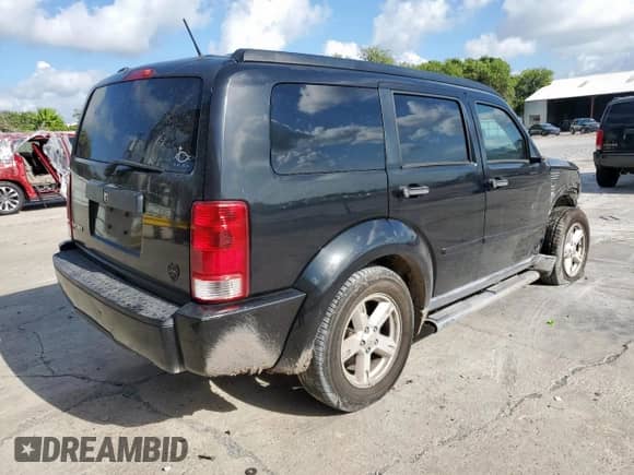 2008 Dodge Nitro SXT с VIN 1D8GT28K88W262446, выставлен на аукционе Copart как лот 64495145 с пробегом 144 668 миль миль и Списание • Salvage title. История ставок и продаж доступна на DreamBid. Изображение 3.