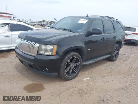 2009 Chevrolet Tahoe 1LT with VIN 1GNFC23J39R132574, listed as a IAAI auction lot 42248919 with 164,926 mi miles and . Bid and sale history available at DreamBid. Image 2.