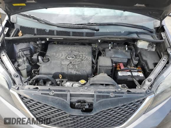 2013 Toyota Sienna SE with VIN 5TDXK3DCXDS347384, listed as a Copart auction lot 70305815 with 94,648 mi miles and Salvage title. Bid and sale history available at DreamBid. Image 12.